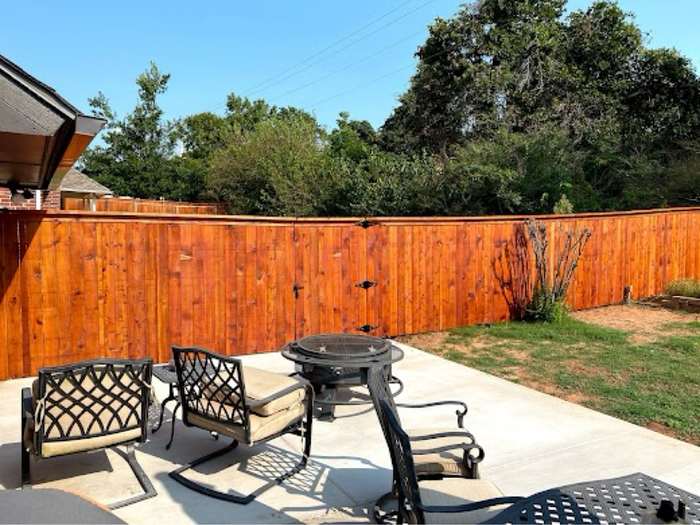 Stained cedar fence with gate