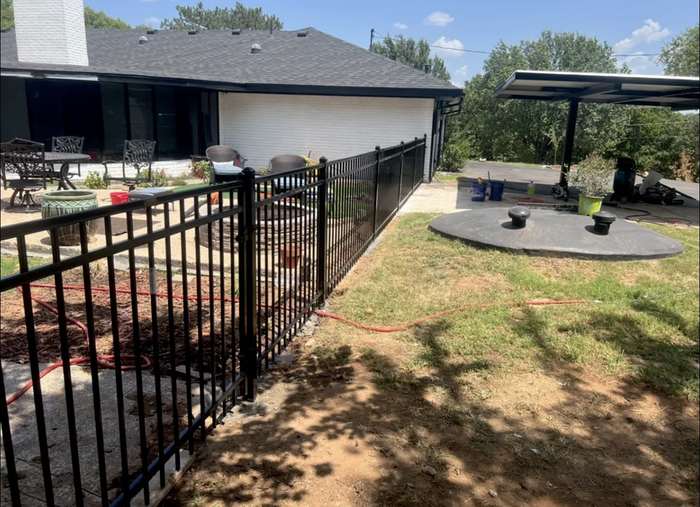 Black ornamental iron fence